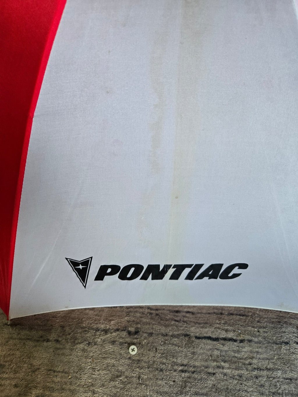 Pontiac red and white umbrella