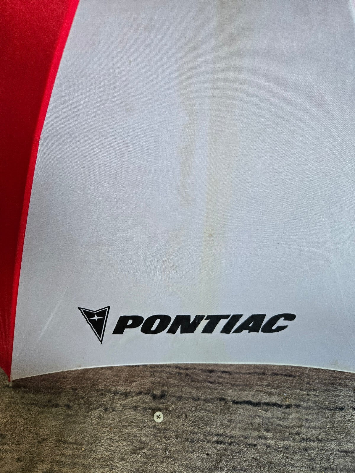 Pontiac red and white umbrella