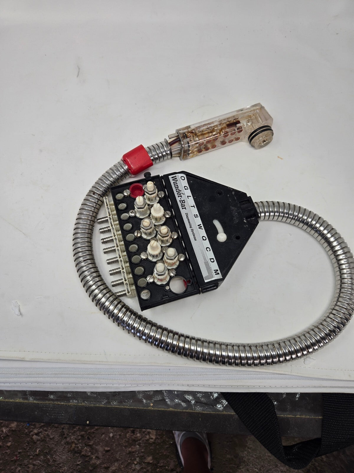 Automatic bar control hose assembly
