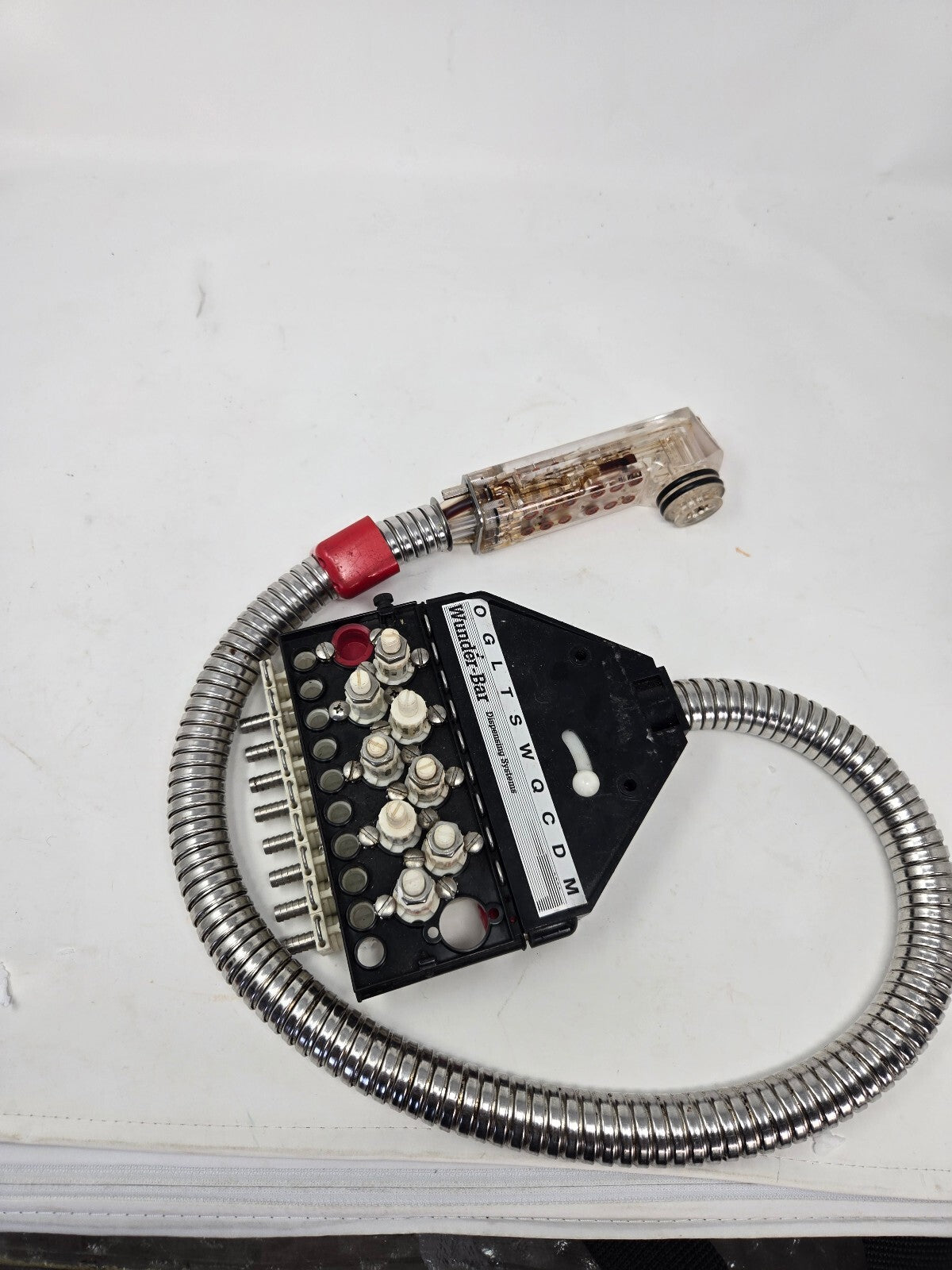 Automatic bar control hose assembly