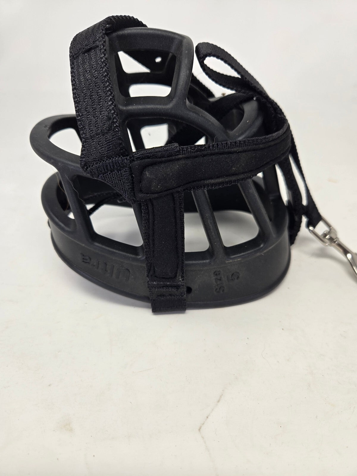 Black dog muzzle with leather strap
