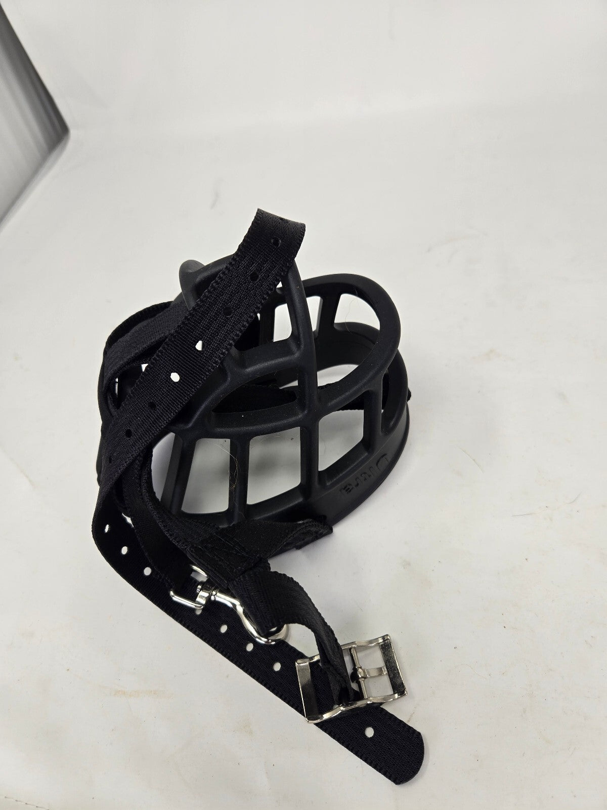 Black dog muzzle with leather strap