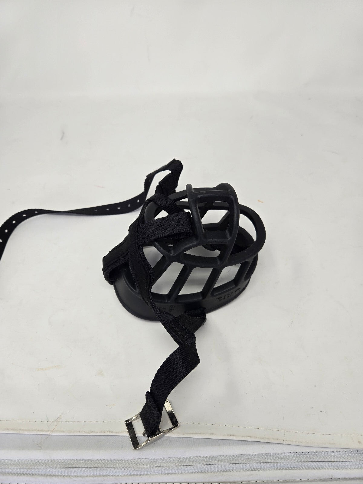 Black dog muzzle with leather strap
