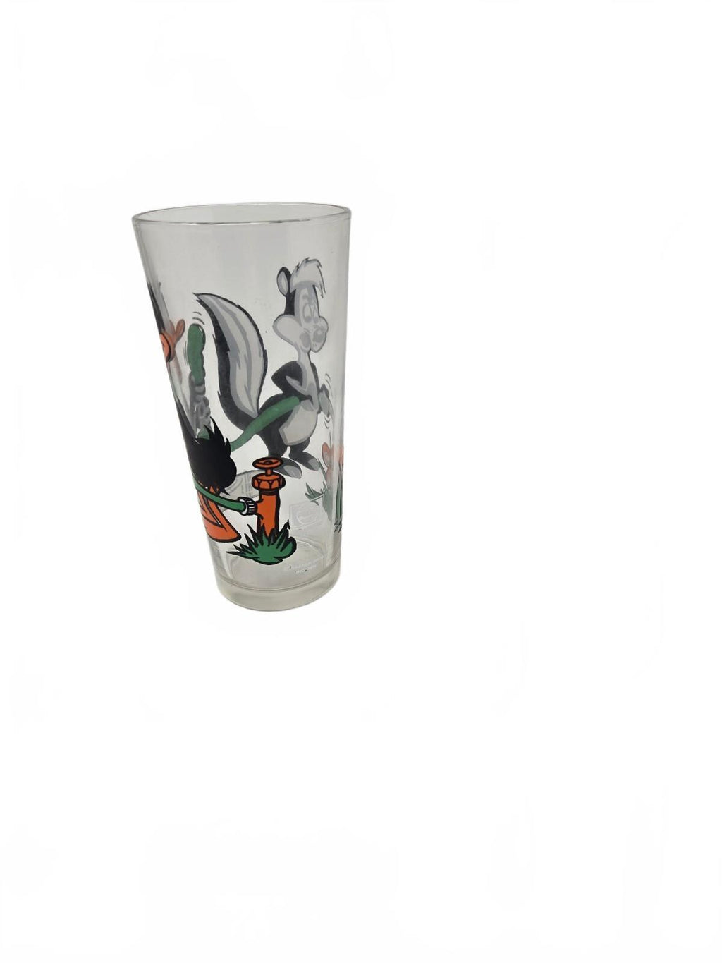 1976 Collector "Looney Tunes" glass featuring Daffy Duck and Pepé Le Pew