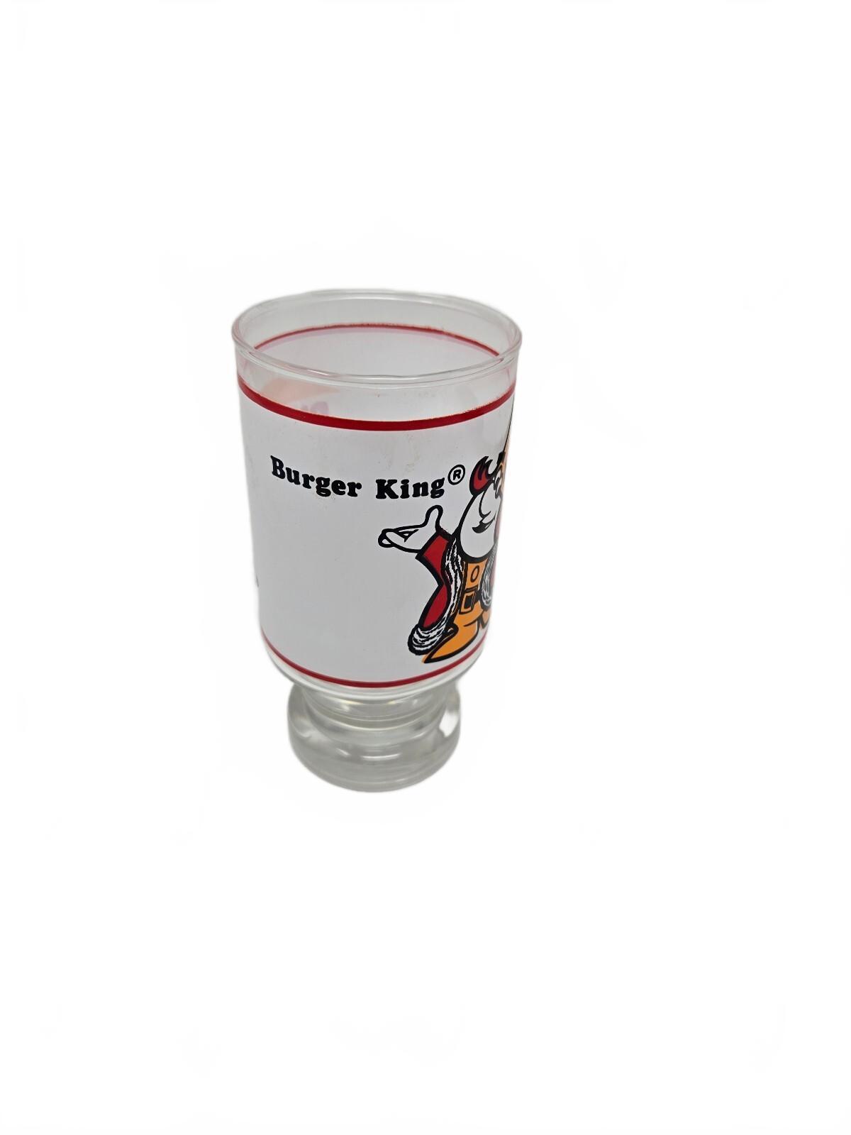 Burger King character drinking glass