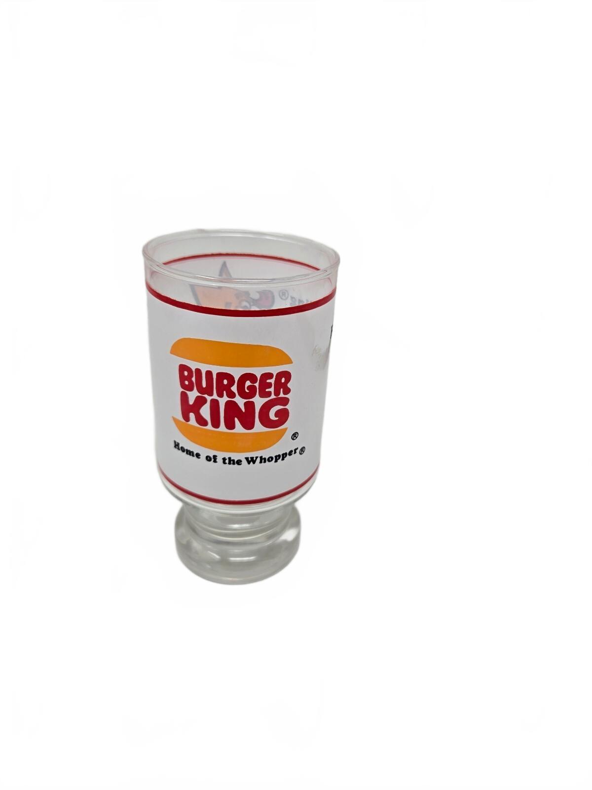Burger King character drinking glass