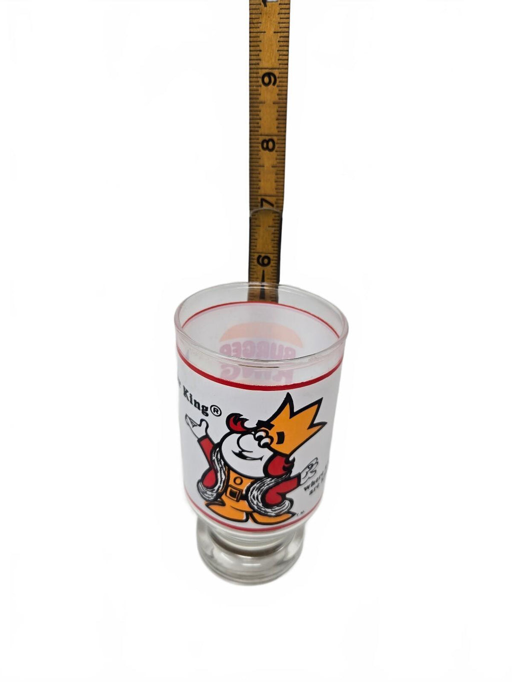 Burger King character drinking glass