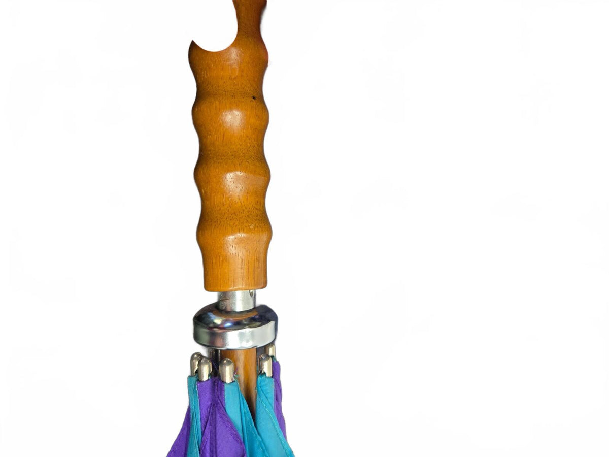 Purple and teal umbrella with wood handle