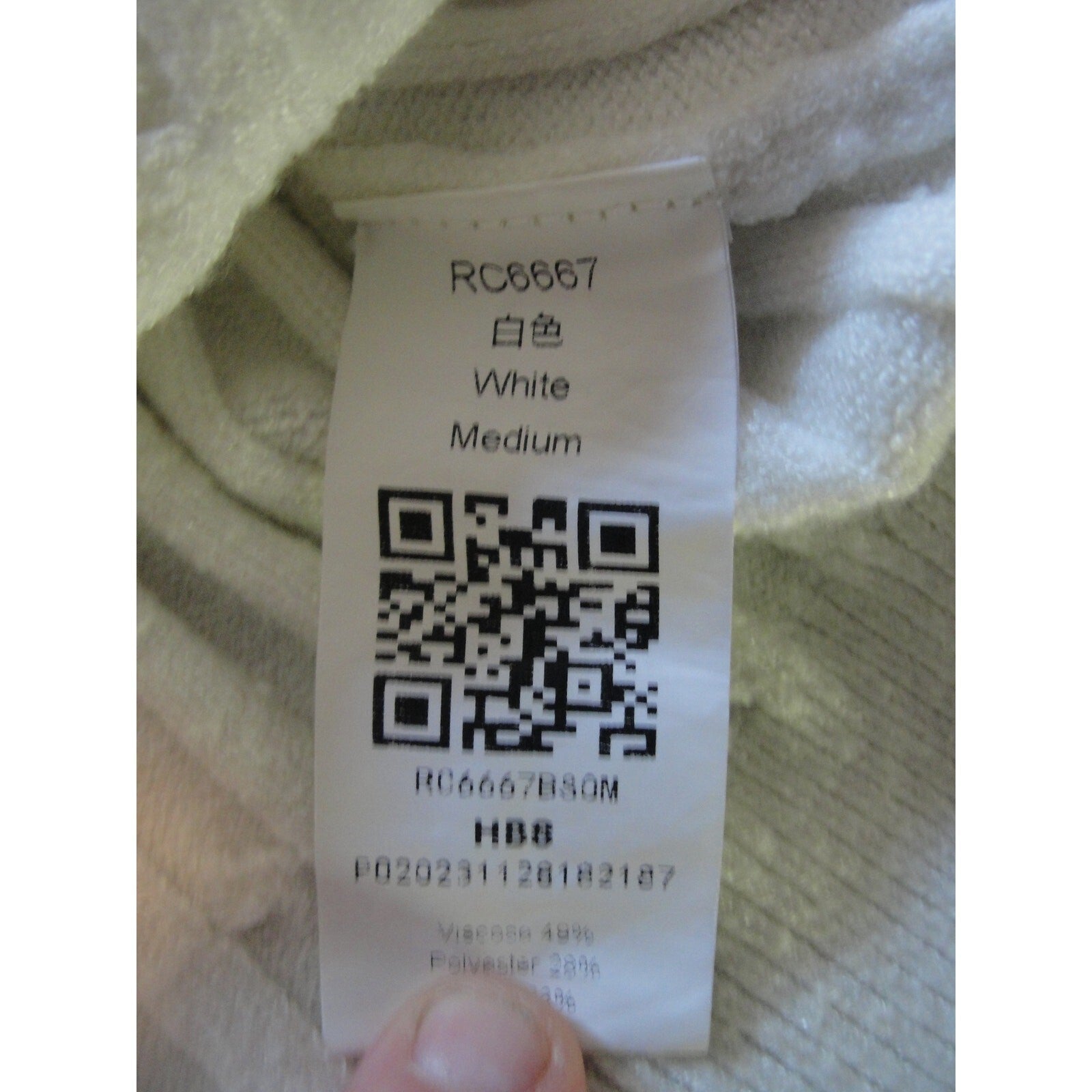 Cream-colored  cable knit V-neck sweater vest size medium