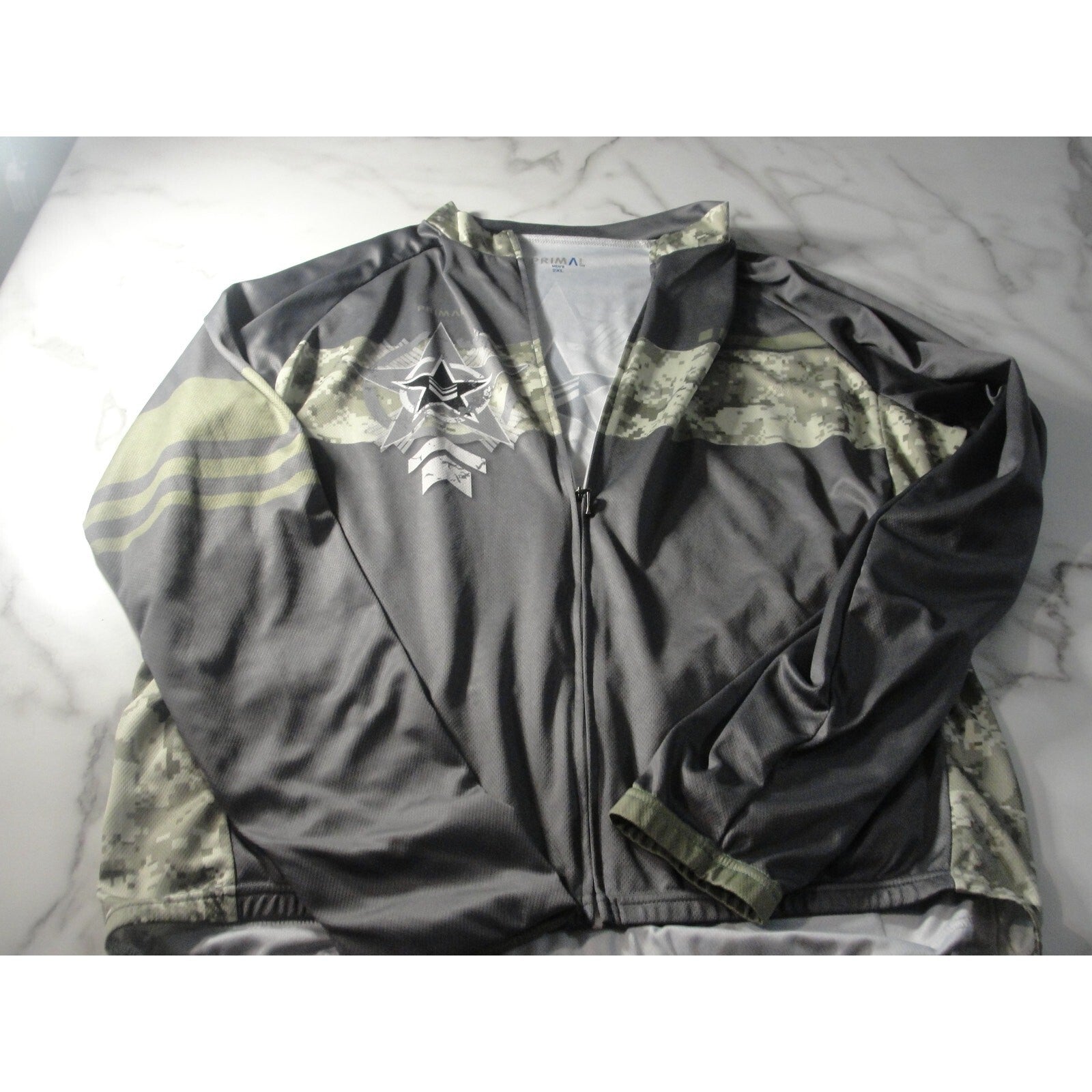 Primal 2xl full Zip and water bottle storage in back Jacket