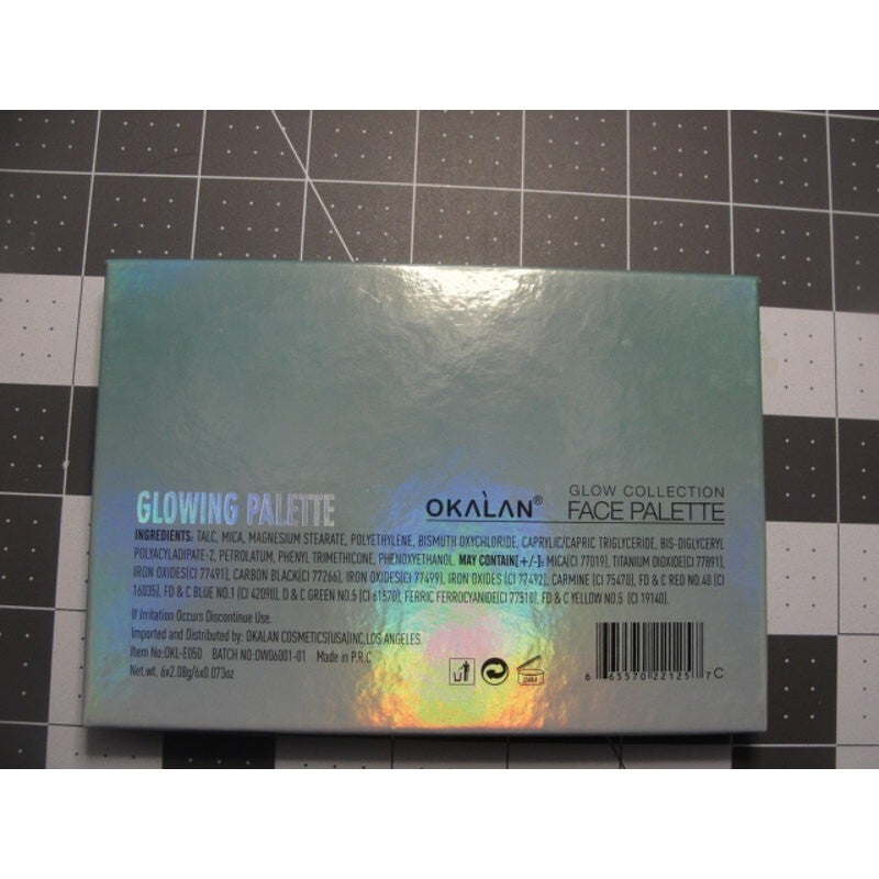 Okalan Glowing Face Palette B shimmers kit in a holographic packaging