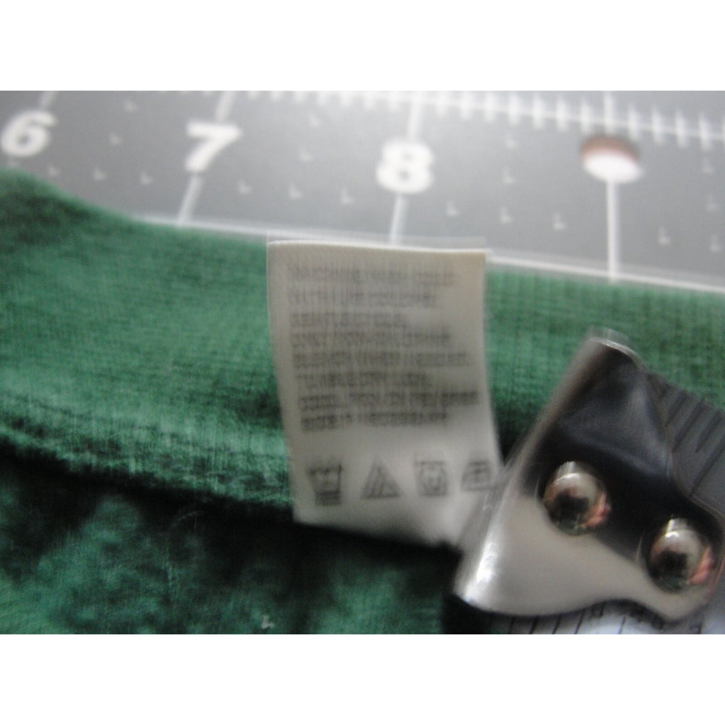 Green crewneck sweatshirt featuring a "New York 1989 Tennis Club" graphic.