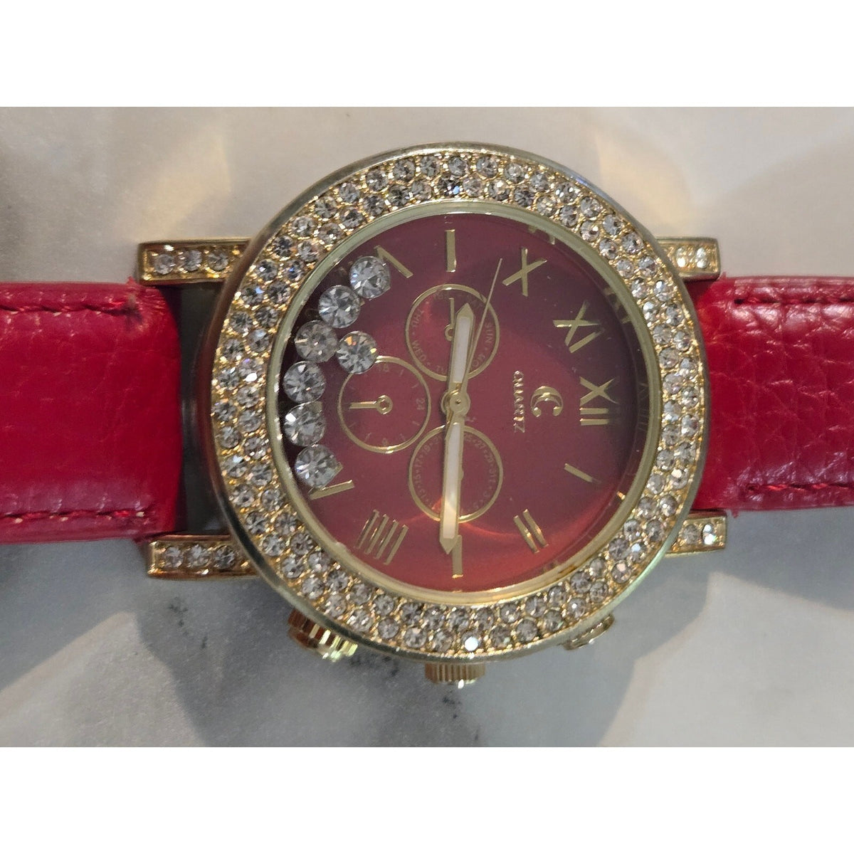 Geneva Platinum Gold Tone Red Dial Rhinestone Floating Crystal Accent Quartz