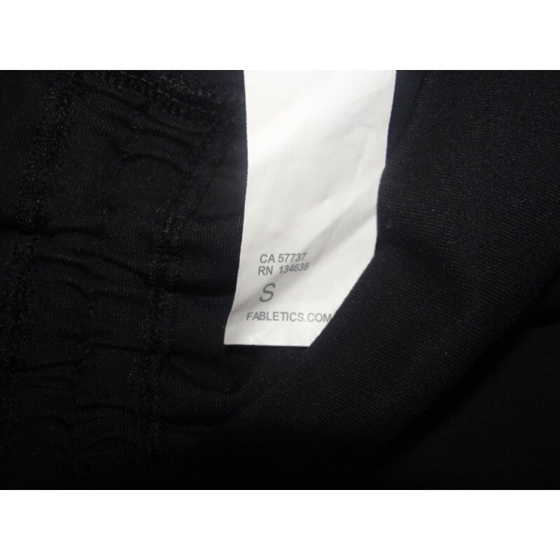Black athletic shorts with a drawstring waistband and a relaxed fit. size small