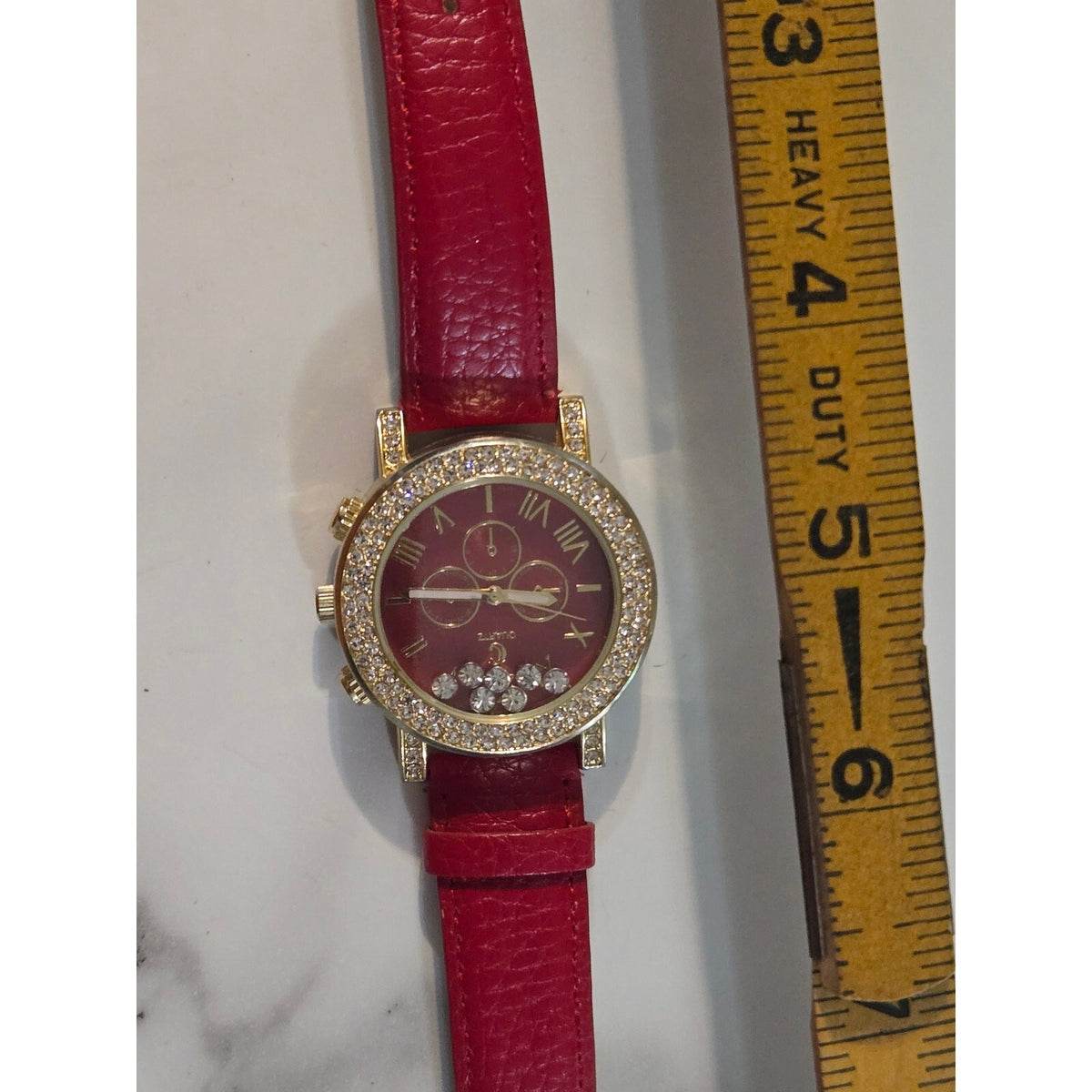Geneva Platinum Gold Tone Red Dial Rhinestone Floating Crystal Accent Quartz