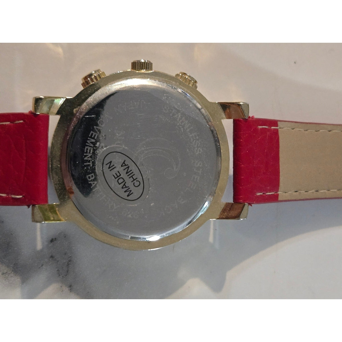 Geneva Platinum Gold Tone Red Dial Rhinestone Floating Crystal Accent Quartz