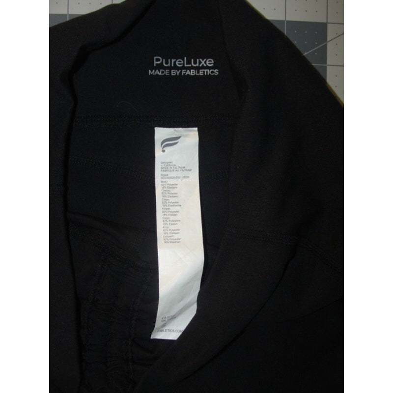 Black athletic shorts with a drawstring waistband and a relaxed fit. size small