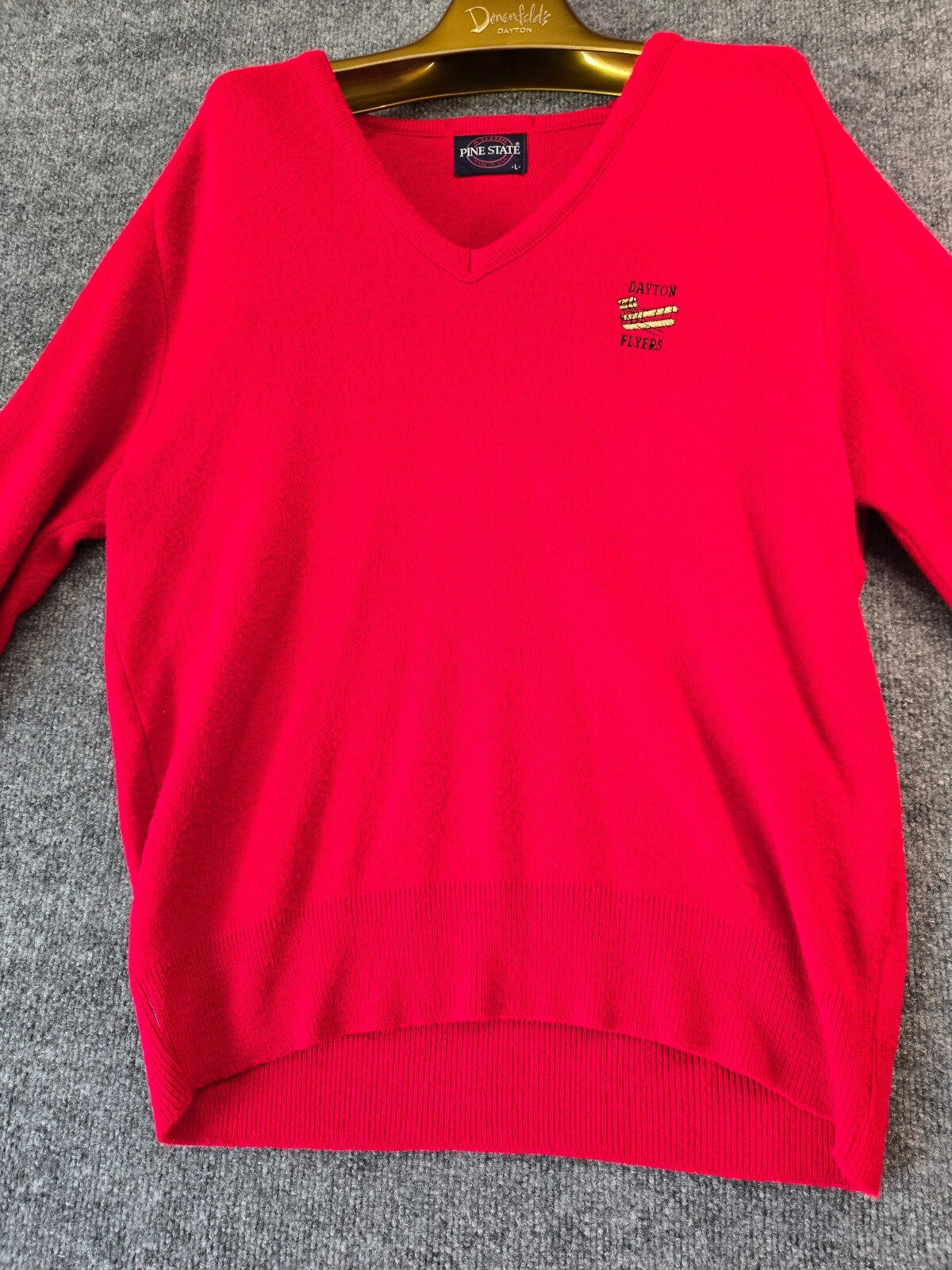 Pine State Red V-Neck Sweater with Chest Emblem