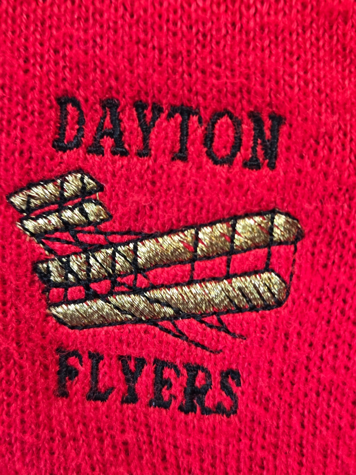 Pine State Red V-Neck Sweater with Chest Emblem