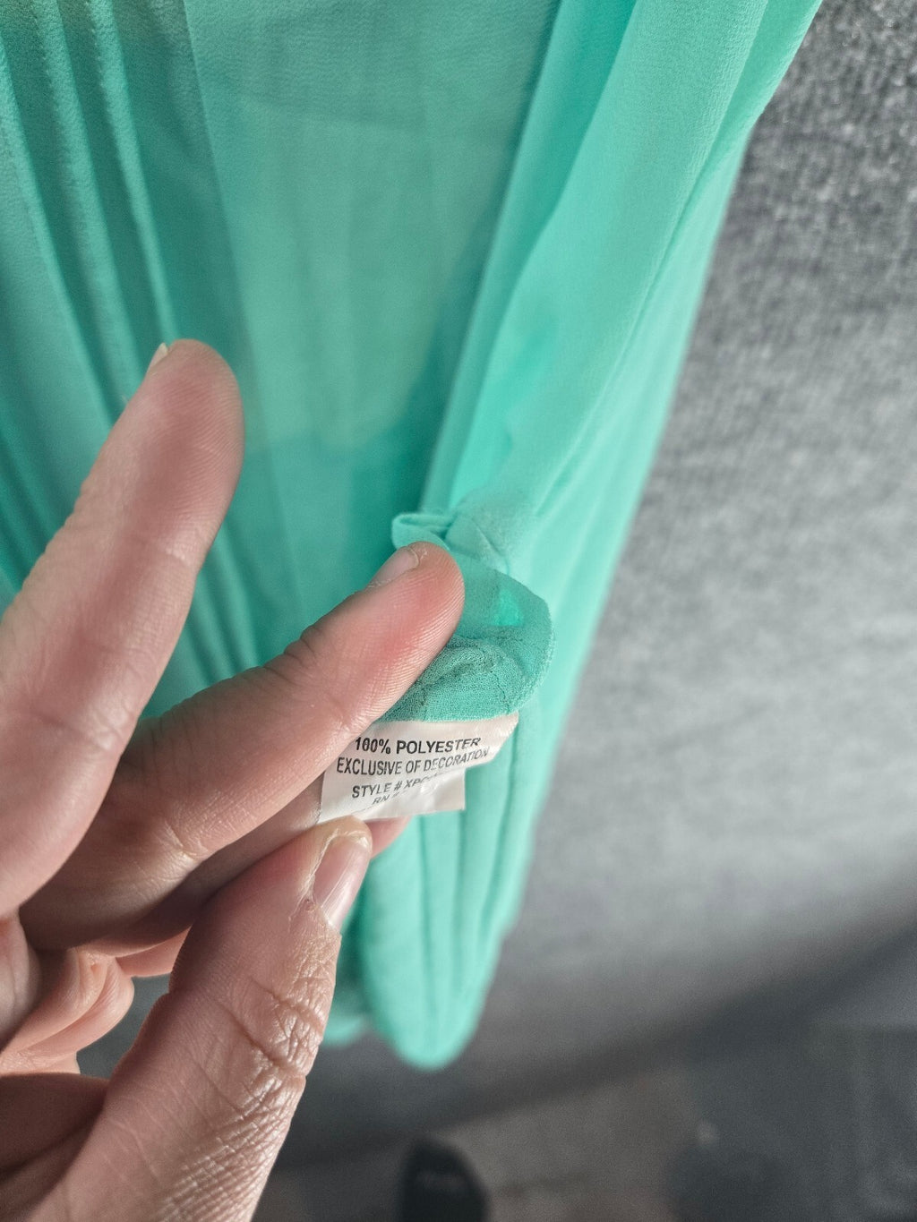 Lightweight Sheer Mint Green Sleeveless Blouse with V-Neck and Pleated Detail