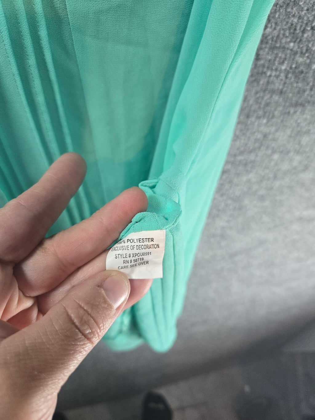 Lightweight Sheer Mint Green Sleeveless Blouse with V-Neck and Pleated Detail
