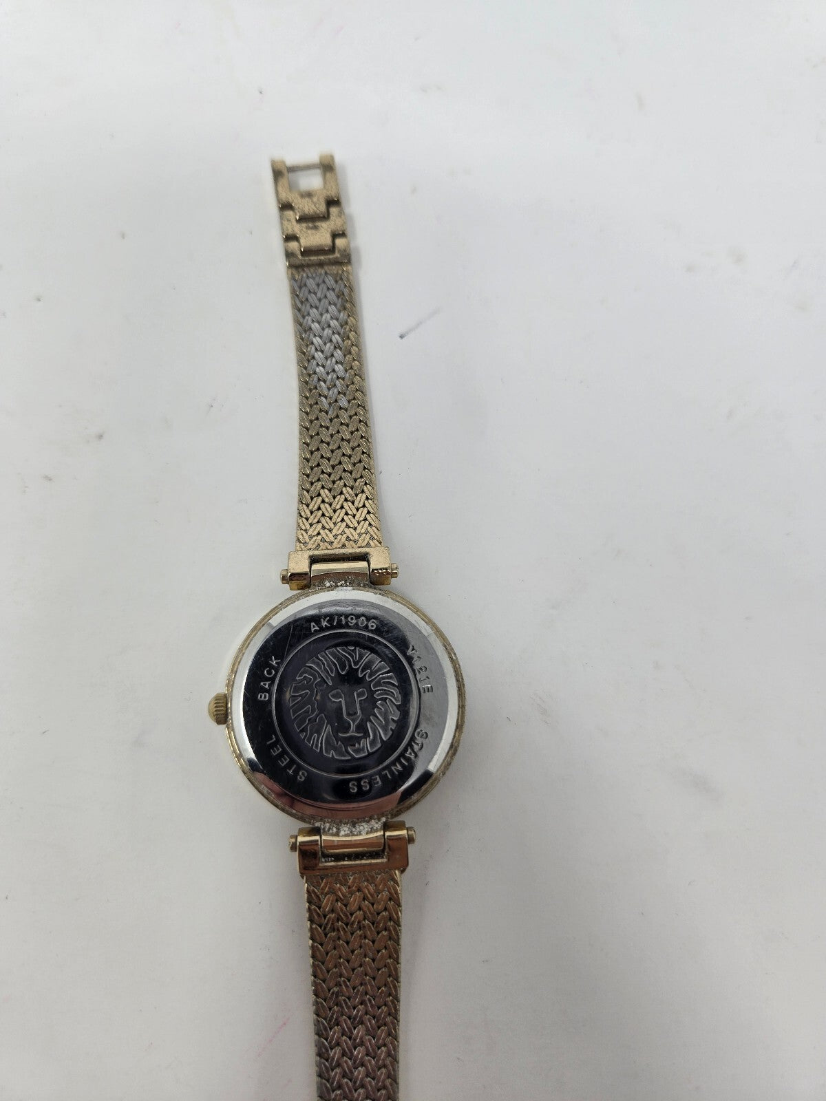 Anne Klein Women's Gold-Tone Mesh Bracelet Watch with Black Dial
