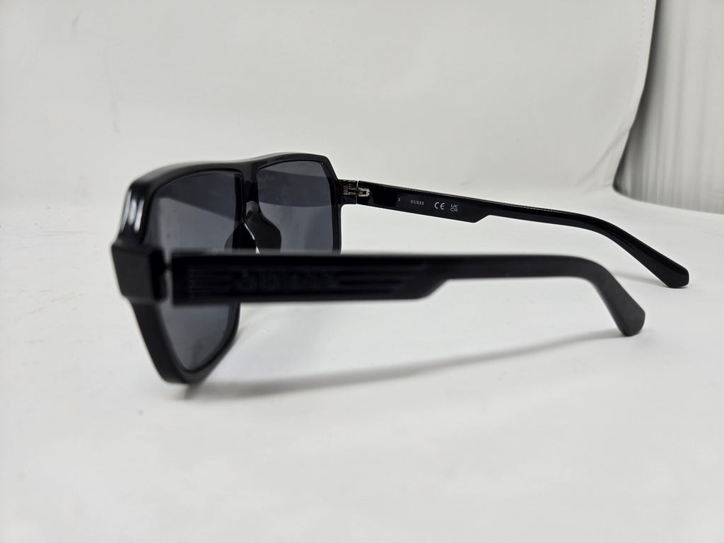 Guess Black Aviator Style Sunglasses with Blue Tinted Lenses