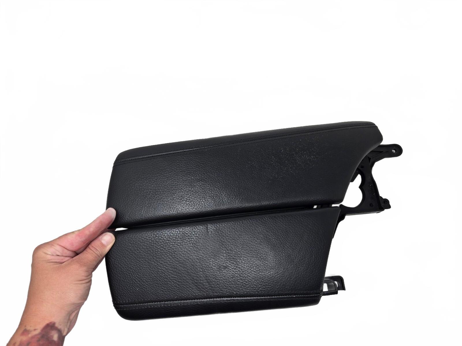 black leather front center console armrest lid for a 2011-2016 BMW 5-Series
