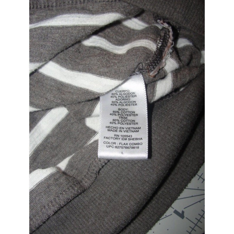 Large greige  and white sweater  size large