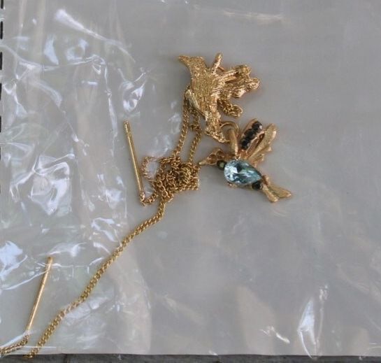 Delicate Gold Tone Bird Earing with Blue Gemstone Accent